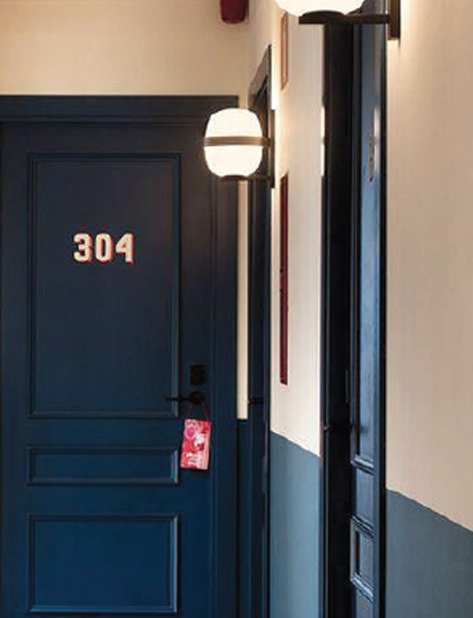 Hotel room hallway with closed doors